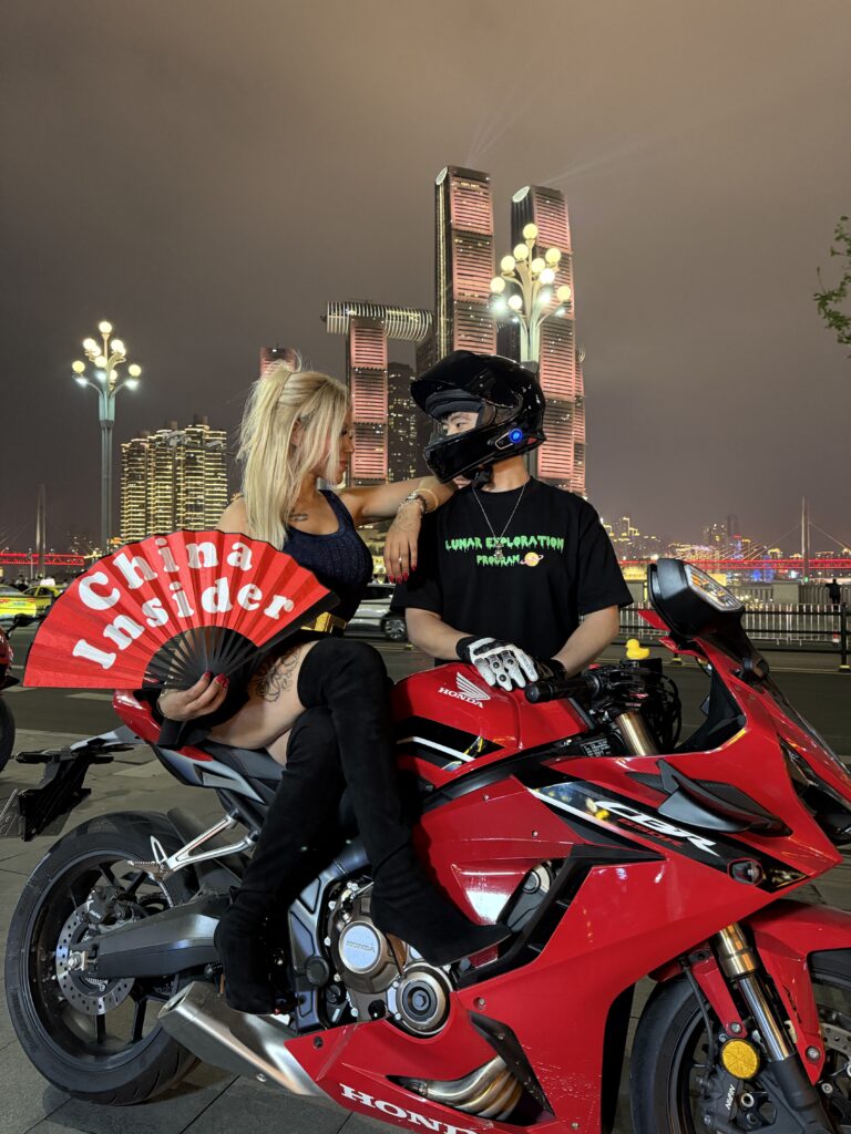 China Insider fan portrait on a red sportbike