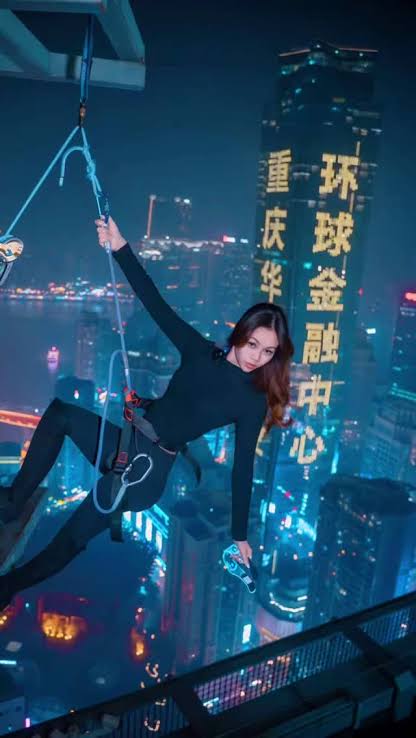 Hanging over the neon towers on the skywalk