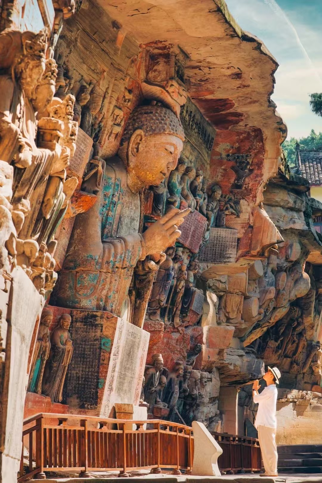 The great cliff wall of carvings