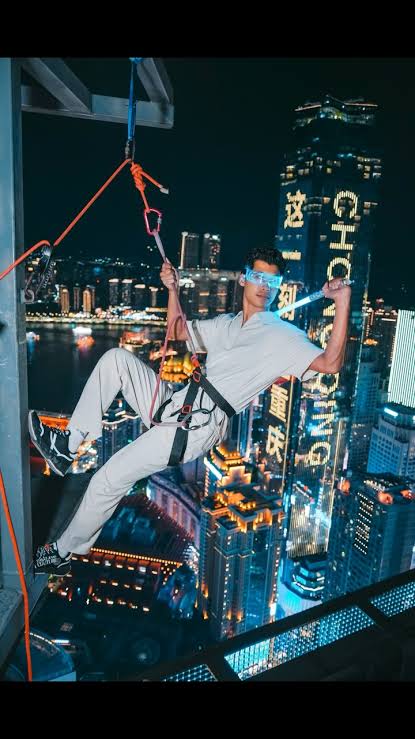 Rope shoot above the Chongqing river lights